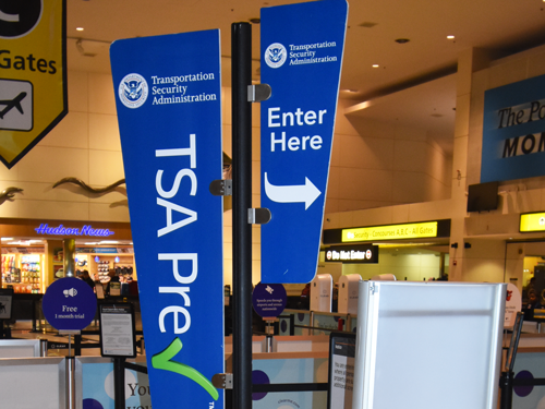 TSA Pre Check signage at a checkpoint