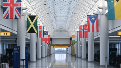 Photo of international flags above a walkway in Concourse E at BWI Marshall Airport