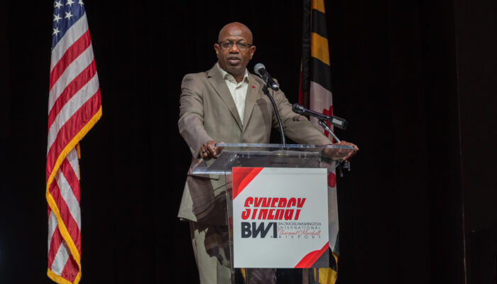 Photo of Maryland Aviation Administration Executive Director/CEO Ricky Smith speaking at the 2024 SynergyBWI Business and Networking Event.