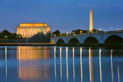 Photo of the Lincoln Memorial and Washington Monument reflecting off the surface of the Potomac River