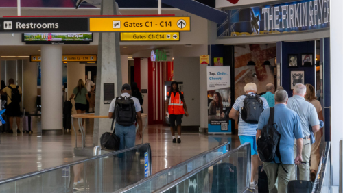 Photo of passengers walking through the B/C Connector inside BWI Thurgood Marshall Airport