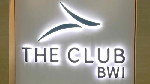 Entrance sign for The Club BWI inside BWI Thurgood Marshall Airport.