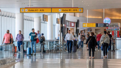 Passengers walking through the B/C Connector inside BWI Thurgood Marshall Airport.